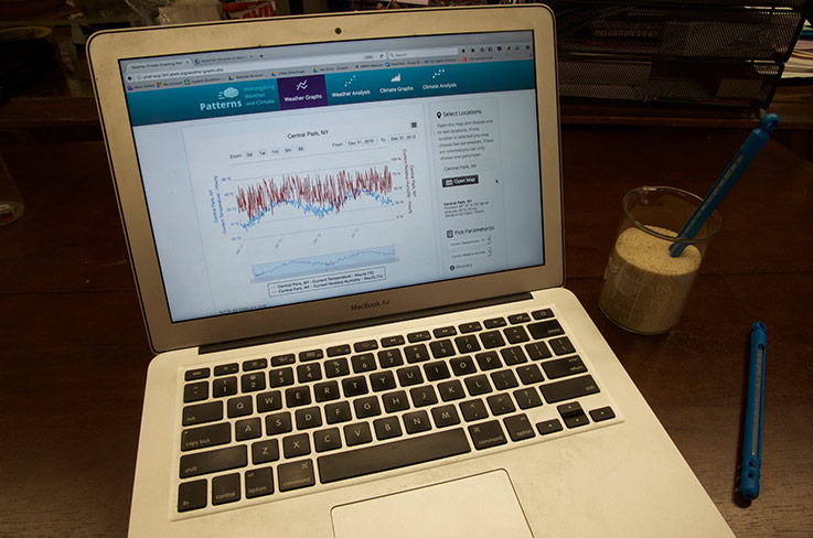 Computer displaying the Patterns Investigating Weather & Climate website by the American Museum of Natural History